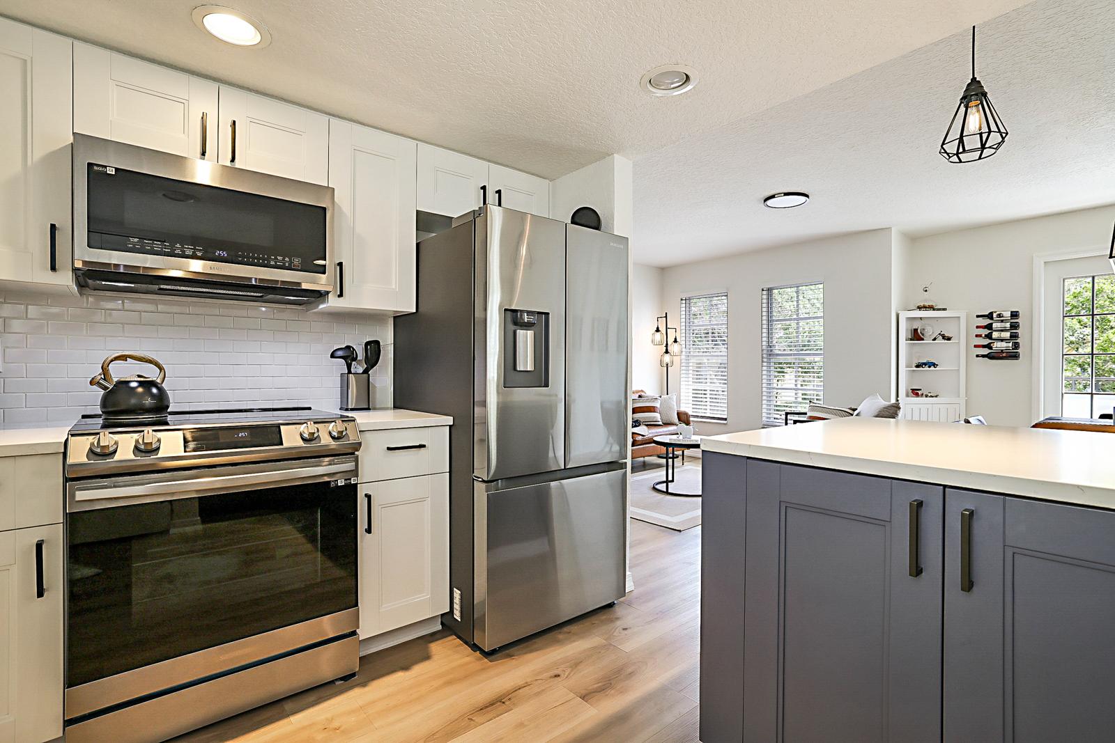 1105 Lake Shore Drive #205, Lake Park, FL 33403 - remodeled kitchen with Samsung stainless appliances