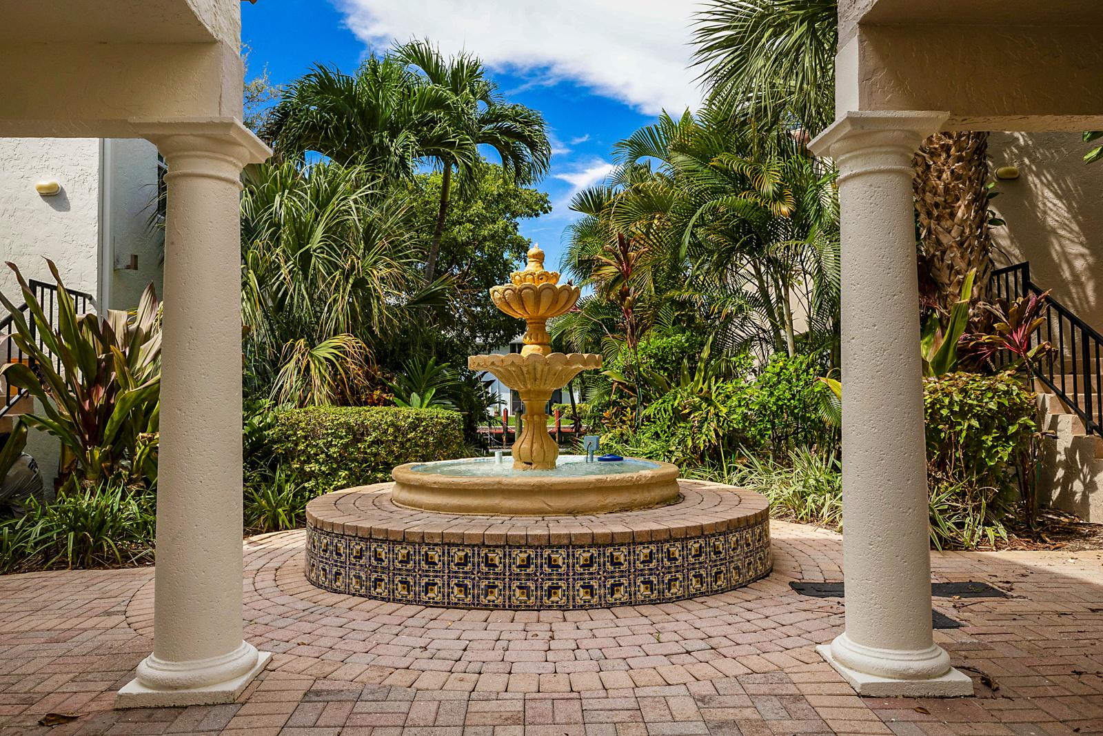 1105 Lake Shore Drive #205, Lake Park, FL 33403 - courtyard fountain at Bay Reach