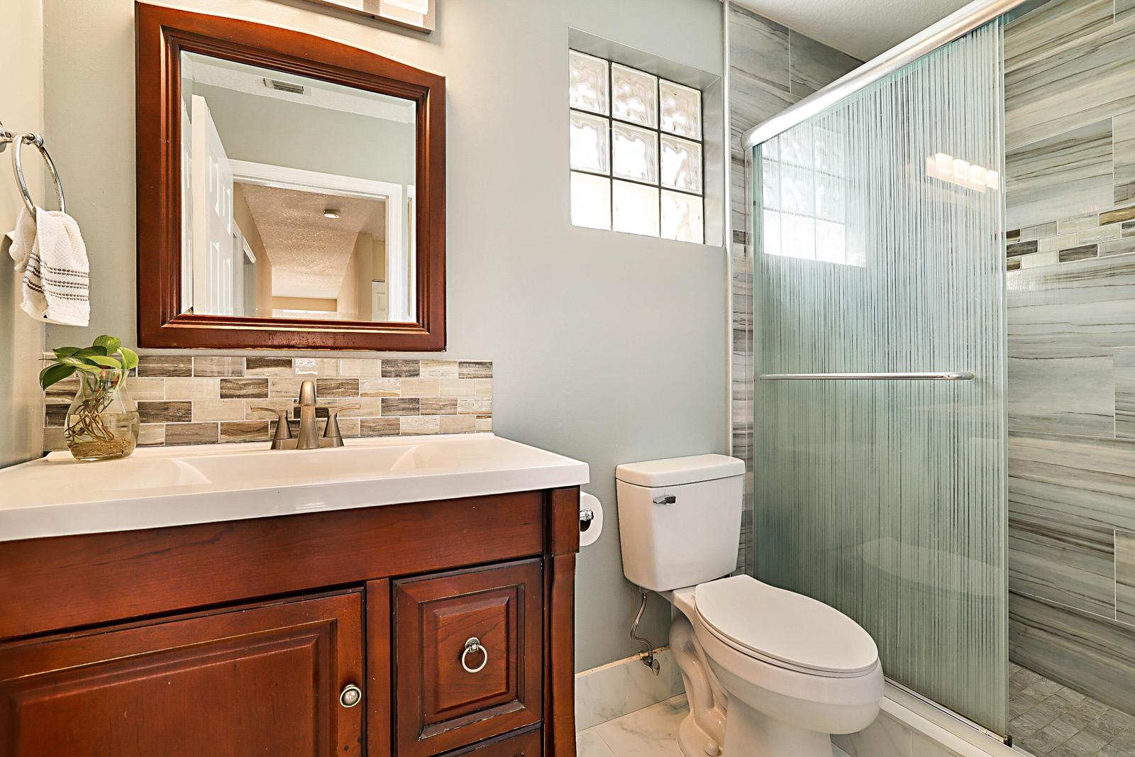 6666 Saltaire Terrace, Margate, FL 33063 - second bathroom with glass shower