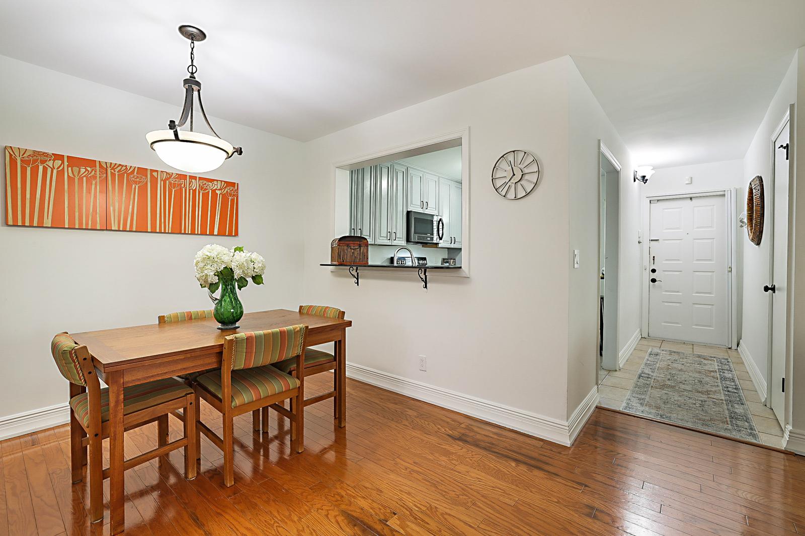 5032 Heatherhill Lane #6, Boca Raton, FL 33486 - dining area with hardwood floors off the kitchen