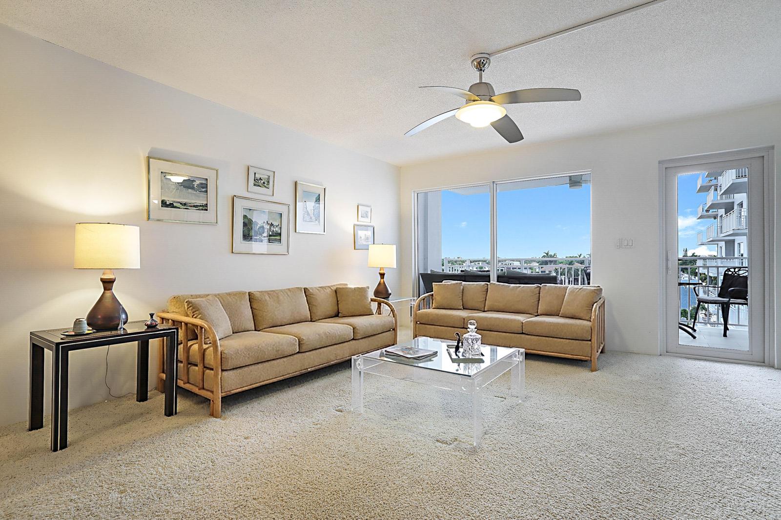 3114 S Ocean Boulevard #509, Highland Beach, FL 33487 - living room with a wall of glass and balcony door